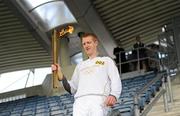 6 June 2012; Kilkenny hurler and 10 time hurling All-Star Henry Shefflin at Croke Park with the Olympic Flame during the London 2012 Olympic Torch Relay through the streets of Dublin. Croke Park, Dublin. Picture credit: Brendan Moran / SPORTSFILE