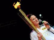 6 June 2012; Irish Olympian & 5000m silver medallist Sonia O'Sullivan with the Olympic Flame during the London 2012 Olympic Torch Relay. St. Stephen's Green, Dublin. Picture credit: Brian Lawless / SPORTSFILE