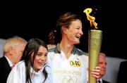 6 June 2012; Irish Olympian & 5000m silver medallist Sonia O'Sullivan and her daughter Sophie, age 10, after lighting the cauldron with the Olympic Flame during the London 2012 Olympic Torch Relay. St. Stephen's Green, Dublin. Picture credit: Brian Lawless / SPORTSFILE