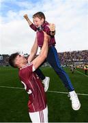 3 September 2017; Jason Flynn of Galway celebrates with Jody Canning, nephew of Joe Canning, following the GAA Hurling All-Ireland Senior Championship Final match between Galway and Waterford at Croke Park in Dublin. Photo by Stephen McCarthy/Sportsfile