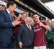 3 September 2017; Taoiseach Leo Varadkar applauds as the President of Ireland Michael D. Higgins  greets Galway captain David Burke before receiving the Liam MacCarthy cup after GAA Hurling All-Ireland Senior Championship Final match between Galway and Waterford at Croke Park in Dublin. Photo by Ray McManus/Sportsfile
