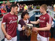 3 September 2017; Margaret Keady with the Liam MacCarthy Cup and Galway captain, David Burke, left, and Joe Canning after  the GAA Hurling All-Ireland Senior Championship Final match between Galway and Waterford at Croke Park in Dublin. Photo by Ray McManus/Sportsfile