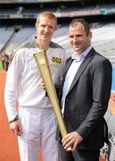 6 June 2012; Kilkenny hurler and 10 time hurling All-Star Henry Shefflin and former Armagh footballer Steven McDonnell with the Olympic Torch during the 2012 Olympic Torch Relay through the streets of Dublin. Croke Park, Dublin. Picture credit: Brendan Moran / SPORTSFILE