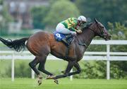 8 June 2012; Louisville Lip, with Fran Berry up, on their way to winning the RSM Farrell Grant Sparks Handicap. Leopardstown Racecourse, Leopardstown, Co. Dublin. Picture credit: Matt Browne / SPORTSFILE