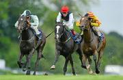8 June 2012; Midnight Soprano, left, with Chris Hayes up, on their way to winning the Seamus & Rosemary McGrath Memorial Saval Beg Stakes from eventual second place Saddler's Rock, with Johnny Murtagh up, right, and eventual third place Unaccompanied, with Pat Smullen up. Leopardstown Racecourse, Leopardstown, Co. Dublin. Picture credit: Matt Browne / SPORTSFILE