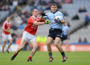 3 June 2012; Kevin McManamon, Dublin, is tackled by Ray Finnegan, Louth. Leinster GAA Football Senior Championship Quarter-Final, Louth v Dublin, Croke Park, Dublin. Picture credit: Stephen McCarthy / SPORTSFILE