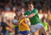 9 June 2012; Shane McGrath, Clare, in action against Pa Ranahan, Limerick. Munster GAA Football Senior Championship Semi-Final, Limerick v Clare, Gaelic Grounds, Limerick. Picture credit: Diarmuid Greene / SPORTSFILE