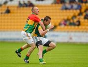 10 June 2012; Graham Reilly, Meath, in action against Paul Reid, Carlow. Leinster GAA Football Senior Championship, Quarter-Final, Meath v Carlow, O'Connor Park, Tullamore, Co. Offaly. Picture credit: Barry Cregg / SPORTSFILE