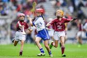 3 September 2017; Gemma Murray of Dromin National School, Dunleer, Co Louth, representing Waterford, in action against Laura Maguire of Scoil Chlann Naofa, Ballinamore, Co Leitrim,  representing Galway, right, and Alex Hodgins of Presentation Primary School, Terenure Road, Dublin, representing Galway, during the INTO Cumann na mBunscol GAA Respect Exhibition Go Games at Galway v Waterford - GAA Hurling All-Ireland Senior Championship Final at Croke Park in Dublin. Photo by Sam Barnes/Sportsfile