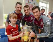 4 September 2017; Tom Breheny, age 9, from Chapelizod in Dublin, with Galway hurlers from left, Colm Callanan, Johnny Coen and David Burke during the All-Ireland Hurling Champions visit to Our Lady's Children's Hospital in Crumlin, Dublin. Photo by Piaras Ó Mídheach/Sportsfile