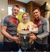 4 September 2017; Anita Lally and her daughter Grace, from Galway, with Galway's Joe Canning, left, and David Burke during the All-Ireland Hurling Champions visit to Our Lady's Children's Hospital in Crumlin, Dublin. Photo by Piaras Ó Mídheach/Sportsfile