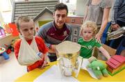 4 September 2017; Galway captain David Burke with Martin Cummins, age 5, from Kildare, left, and James Dillon, age 4, from Dundrum in Dublin, during the All-Ireland Hurling Champions visit to Our Lady's Children's Hospital in Crumlin, Dublin. Photo by Piaras Ó Mídheach/Sportsfile