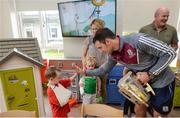 4 September 2017; Martin Cummins, age 5, from Kildare, with Galway captain David Burke during the All-Ireland Hurling Champions visit to Our Lady's Children's Hospital in Crumlin, Dublin. Photo by Piaras Ó Mídheach/Sportsfile