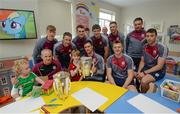 4 September 2017; James Dillon, age 4, from Dundrum in Dublin, left, and Tom Breheny, age 9, from Chapelizod in Dublin, with members of the Galway team and backroom team during the All-Ireland Hurling Champions visit to Our Lady's Children's Hospital in Crumlin, Dublin. Photo by Piaras Ó Mídheach/Sportsfile