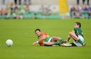 10 June 2012; Derek Hayden, Carlow, is fouled by Bryan Menon, Meath. Leinster GAA Football Senior Championship, Quarter-Final, Meath v Carlow, O'Connor Park, Tullamore, Co. Offaly. Picture credit: Barry Cregg / SPORTSFILE