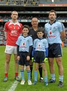 3 June 2012; Conor Tierney, right, aged 8, from Raheny and Jonah Duffy, aged 10, from Clonsilla, who led the Dublin team out on to the pitch, with referee Eddie Kinsella, Louth captain Paddy Keenan and Dublin captain Bryan Cullen, before the game. Leinster GAA Football Senior Championship Quarter-Final, Louth v Dublin, Croke Park, Dublin. Photo by Sportsfile