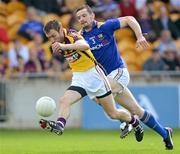 10 June 2012; Redmond Barry, Wexford , in action against Barry Gilleran, Longford. Leinster GAA Football Senior Championship, Quarter-Final Replay, Longford v Wexford, O'Connor Park, Tullamore, Co. Offaly. Picture credit: Matt Browne / SPORTSFILE
