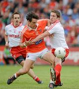 10 June 2012; Jamie Clarke, Armagh, in action against Dermot Carlin, Tyrone. Ulster GAA Football Senior Championship, Quarter-Final, Armagh v Tyrone, Morgan Athletic Grounds, Armagh. Picture credit: Oliver McVeigh / SPORTSFILE