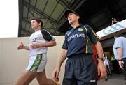 10 June 2012; Kerry manager Jack O'Connor and Eoin Brosnan make their way out for the start of the match.  Munster GAA Football Senior Championship, Semi-Final, Cork v Kerry, Pairc Ui Chaoimh, Cork. Picture credit: Diarmuid Greene / SPORTSFILE