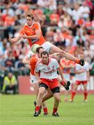 10 June 2012; Kieran Toner, Armagh, in action against Colm Cavanagh, Tyrone. Ulster GAA Football Senior Championship, Quarter-Final, Armagh v Tyrone, Morgan Athletic Grounds, Armagh. Picture credit: Oliver McVeigh / SPORTSFILE