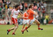 10 June 2012; Kevin Dyas, Armagh, in action against Joe McMahon, Tyrone. Ulster GAA Football Senior Championship, Quarter-Final, Armagh v Tyrone, Morgan Athletic Grounds, Armagh. Picture credit: Oliver McVeigh / SPORTSFILE
