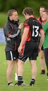 10 June 2012; Seanie Johnston, St. Kevin's GAA Club,  Staplestown, North Kildare, who scored five points in a 1 - 11 to 1 - 8 victory, listens to team manager Gordon Ward before the game. Kildare Senior Football League, Division 2, Kilcock GAA Club v St Kevin's GAA Club, Kilcock GAA Club, Baltracey, Kilcock, Co. Kildare. Picture credit: Ray McManus / SPORTSFILE