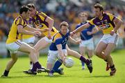 10 June 2012; Sean McCormack, Longford, in action against Graeme Molloy, Daithi Waters, 8, Niall Murphy, 2, Wexford. Leinster GAA Football Senior Championship, Quarter-Final Replay, Longford v Wexford, O'Connor Park, Tullamore, Co. Offaly. Picture credit: Matt Browne / SPORTSFILE