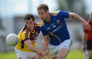 10 June 2012; Brian Kavanagh, Longford, in action against Graeme Molloy, Wexford. Leinster GAA Football Senior Championship, Quarter-Final Replay, Longford v Wexford, O'Connor Park, Tullamore, Co. Offaly. Picture credit: Matt Browne / SPORTSFILE