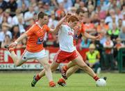 10 June 2012; Peter Harte, Tyrone, in action against Finnian Moriarty, left, and Brendan Donaghy, Armagh. Ulster GAA Football Senior Championship, Quarter-Final, Armagh v Tyrone, Morgan Athletic Grounds, Armagh. Picture credit: Brian Lawless / SPORTSFILE