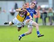 10 June 2012; Redmond Barry, Wexford, in action against Declan Reilly, Longford. Leinster GAA Football Senior Championship, Quarter-Final Replay, Longford v Wexford, O'Connor Park, Tullamore, Co. Offaly. Picture credit: Matt Browne / SPORTSFILE