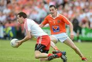 10 June 2012; Colm Cavanagh, Tyrone, in action against Andy Mallon, Armagh. Ulster GAA Football Senior Championship, Quarter-Final, Armagh v Tyrone, Morgan Athletic Grounds, Armagh. Picture credit: Brian Lawless / SPORTSFILE