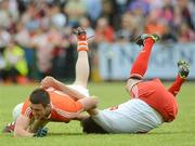 10 June 2012; John Kingham, Armagh, in action against Joe McMahon, Tyrone. Ulster GAA Football Senior Championship, Quarter-Final, Armagh v Tyrone, Morgan Athletic Grounds, Armagh. Picture credit: Brian Lawless / SPORTSFILE