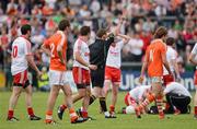 10 June 2012; Referee Joe McQuillan issues a red card to Kevin Dyas, Armagh, in the second half. Ulster GAA Football Senior Championship, Quarter-Final, Armagh v Tyrone, Morgan Athletic Grounds, Armagh. Picture credit: Oliver McVeigh / SPORTSFILE