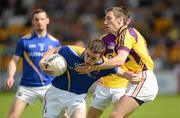 10 June 2012; Colm P. Smyth, Longford, in action against Redmond Barry, Wexford. Leinster GAA Football Senior Championship, Quarter-Final Replay, Longford v Wexford, O'Connor Park, Tullamore, Co. Offaly. Picture credit: Barry Cregg / SPORTSFILE