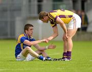 10 June 2012; Colm P. Smyth, Longford, is commiserated by John Leacy, Wexford, after the game. Leinster GAA Football Senior Championship, Quarter-Final Replay, Longford v Wexford, O'Connor Park, Tullamore, Co. Offaly. Picture credit: Barry Cregg / SPORTSFILE