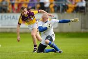 10 June 2012; Damien Sheridan, Longford, in action against Redmond Barry, Wexford. Leinster GAA Football Senior Championship, Quarter-Final Replay, Longford v Wexford, O'Connor Park, Tullamore, Co. Offaly. Picture credit: Barry Cregg / SPORTSFILE