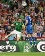10 June 2012; Robbie Keane, Republic of Ireland, in action against Vedran Corluka, Croatia. EURO2012, Group C, Republic of Ireland v Croatia, Municipal Stadium Poznan, Poznan, Poland. Photo by Sportsfile