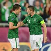 10 June 2012; Republic of Ireland's Sean St. Ledger, left, is congratulated by team captain Robbie Keane after scoring his side's equalising goal after 19 minutes. EURO2012, Group C, Republic of Ireland v Croatia, Municipal Stadium Poznan, Poznan, Poland. Photo by Sportsfile