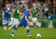 10 June 2012; Luka Modric, Croatia, in action against Keith Andrews, Republic of Ireland. EURO2012, Group C, Republic of Ireland v Croatia, Municipal Stadium Poznan, Poznan, Poland. Picture credit: David Maher / SPORTSFILE