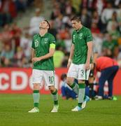10 June 2012; Robbie Keane, left, and Stephen Ward, Republic of Ireland, after Croatia scored their second goal of the game. EURO2012, Group C, Republic of Ireland v Croatia, Municipal Stadium Poznan, Poznan, Poland. Picture credit: David Maher / SPORTSFILE