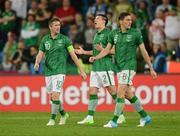 10 June 2012; Republic of Ireland players, from left, Robbie Keane, Sean St. Ledger and Keith Andrews react after Nikica Jelavic, Croatia, scored his side's second goal after 43 minutes. EURO2012, Group C, Republic of Ireland v Croatia, Municipal Stadium Poznan, Poznan, Poland. Photo by Sportsfile