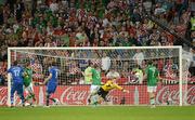 10 June 2012; Republic of Ireland goalkeeper Shay Given is beaten by Mario Mandžukic, 17, Croatia, to score his side's third goal after 48 minutes. EURO2012, Group C, Republic of Ireland v Croatia, Municipal Stadium Poznan, Poznan, Poland. Photo by Sportsfile