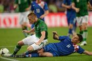 10 June 2012; Damien Duff, Republic of Ireland, in action against Ognjen Vukojevic, Croatia. EURO2012, Group C, Republic of Ireland v Croatia, Municipal Stadium Poznan, Poznan, Poland. Picture credit: David Maher / SPORTSFILE