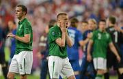 10 June 2012; A dejected Damien Duff, right, and John O'Shea, Republic of Ireland, after the game. EURO2012, Group C, Republic of Ireland v Croatia, Municipal Stadium Poznan, Poznan, Poland. Picture credit: David Maher / SPORTSFILE