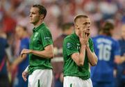 10 June 2012; A dejected Damien Duff, right, and John O'Shea, Republic of Ireland, after the game. EURO2012, Group C, Republic of Ireland v Croatia, Municipal Stadium Poznan, Poznan, Poland. Picture credit: David Maher / SPORTSFILE