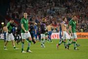 10 June 2012; Republic of Ireland players, including Robbie Keans, John O'Shea and Richard Dunne, leave the field after the game. EURO2012, Group C, Republic of Ireland v Croatia, Municipal Stadium Poznan, Poznan, Poland. Photo by Sportsfile