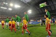 10 June 2012; Republic of Ireland players make their way on to the pitch for the game against Croatia. EURO2012, Group C, Republic of Ireland v Croatia, Municipal Stadium Poznan, Poznan, Poland. Picture credit: David Maher / SPORTSFILE