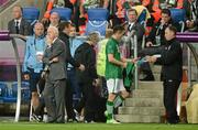 10 June 2012; Robbie Keane, Republic of Ireland, walks past manager Giovanni Trapattoni after been substitued in the second half of the game. EURO2012, Group C, Republic of Ireland v Croatia, Municipal Stadium Poznan, Poznan, Poland. Picture credit: David Maher / SPORTSFILE