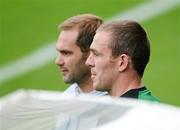 11 June 2012; Republic of Ireland's Richard Dunne, right, with former Republic of Ireland International Jason McAteer during squad training ahead of their UEFA EURO 2012, Group C, game against Spain on Thursday. Republic of Ireland EURO2012 Squad Training, Municipal Stadium Gdynia, Poland. Picture credit: David Maher / SPORTSFILE