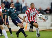 29 August 2002; David Kelly of Derry City in action against Darragh McGuire of St Patrick's Athletic during the eircom League Premier Division match between Derry City and St Patrick's Athletic at Brandywell Stadium in Derry. Photo by David Maher/Sportsfile